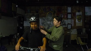 Mark putting helmet on antonio