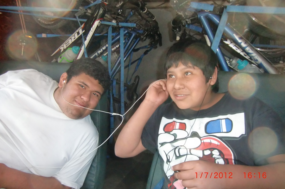 boys sharing some music