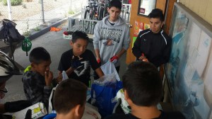 Gearing up and packing lunches for the ride at the Launch Pad